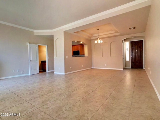 3820 E Mcdowell Rd Unit 102, Phoenix, AZ 85008 - spare room with a chandelier, arched walkways, light tile patterned floors, baseboards, and crown molding