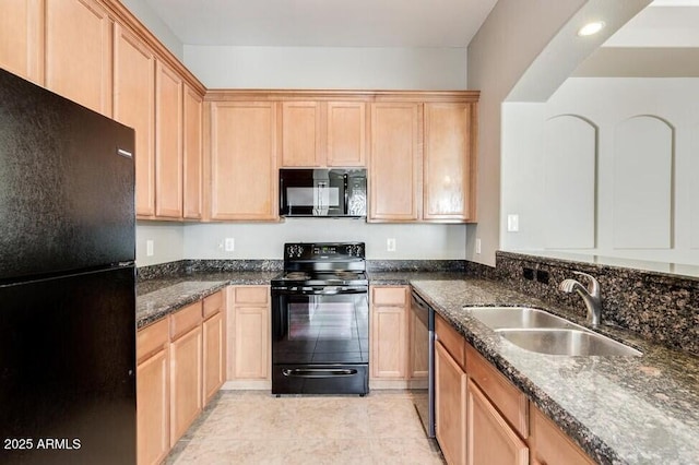 3820 E Mcdowell Rd Unit 102, Phoenix, AZ 85008 - kitchen with black appliances, a sink, light brown cabinets, dark stone countertops, and recessed lighting
