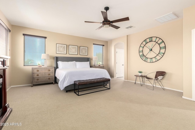 bedroom with carpet flooring, visible vents, and baseboards