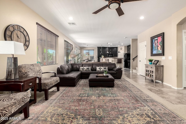 living area featuring visible vents, ceiling fan, recessed lighting, and baseboards