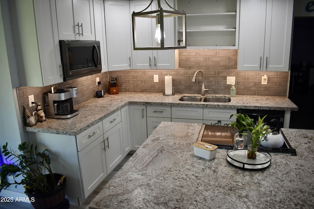 4755 E Gary St, Mesa, AZ 85205 - kitchen with black appliances, white cabinets, tasteful backsplash, and open shelves