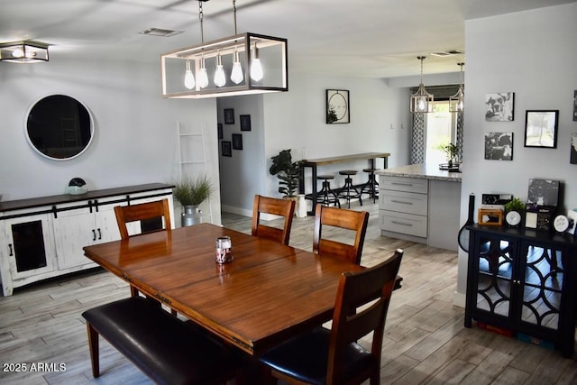 4755 E Gary St, Mesa, AZ 85205 - dining area with light wood finished floors