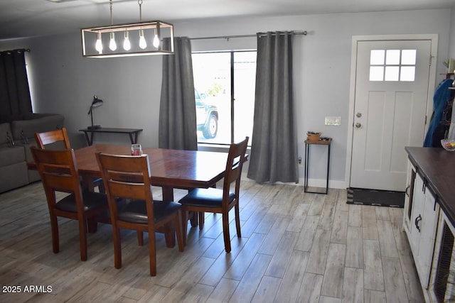 4755 E Gary St, Mesa, AZ 85205 - dining area featuring healthy amount of natural light and light wood-style floors