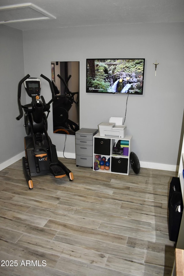 4755 E Gary St, Mesa, AZ 85205 - workout room featuring baseboards and wood finished floors