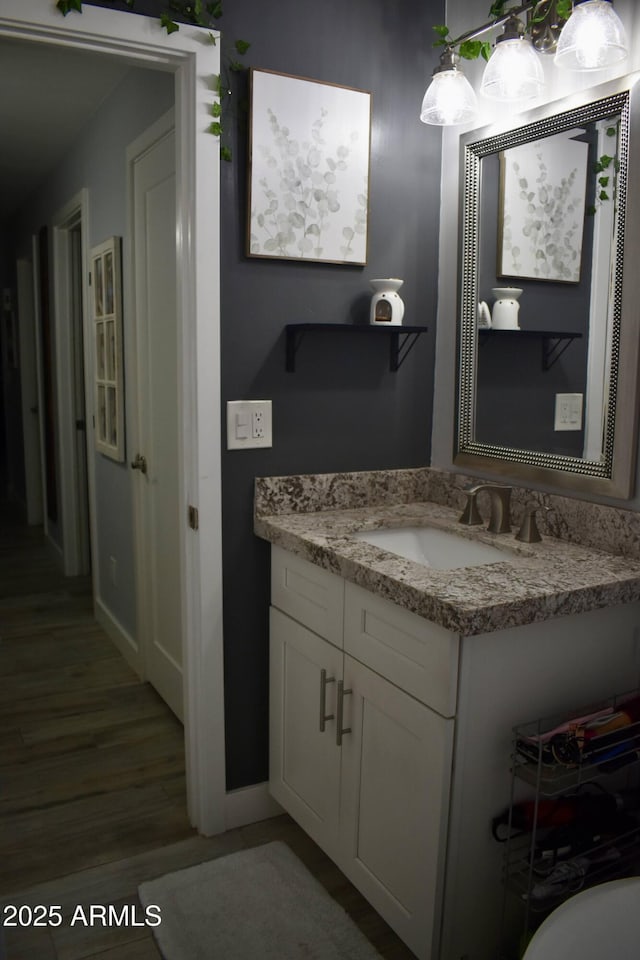 4755 E Gary St, Mesa, AZ 85205 - bathroom featuring vanity and wood finished floors