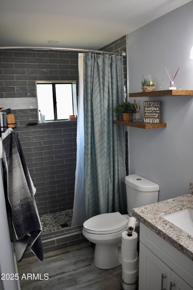4755 E Gary St, Mesa, AZ 85205 - full bathroom featuring vanity, a stall shower, and wood finished floors