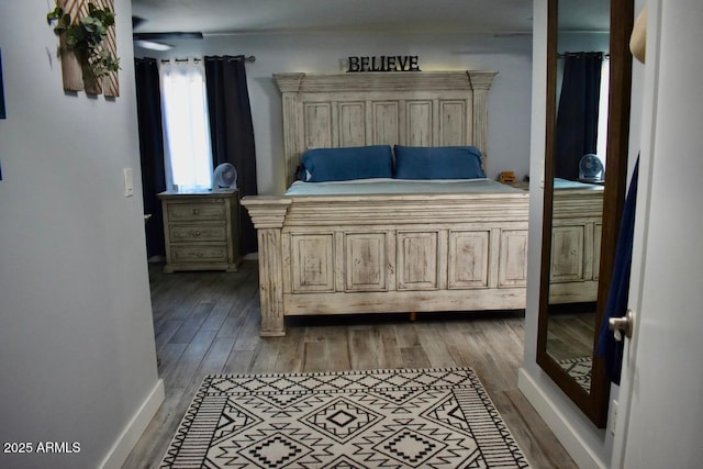 4755 E Gary St, Mesa, AZ 85205 - bedroom with wood finished floors and baseboards