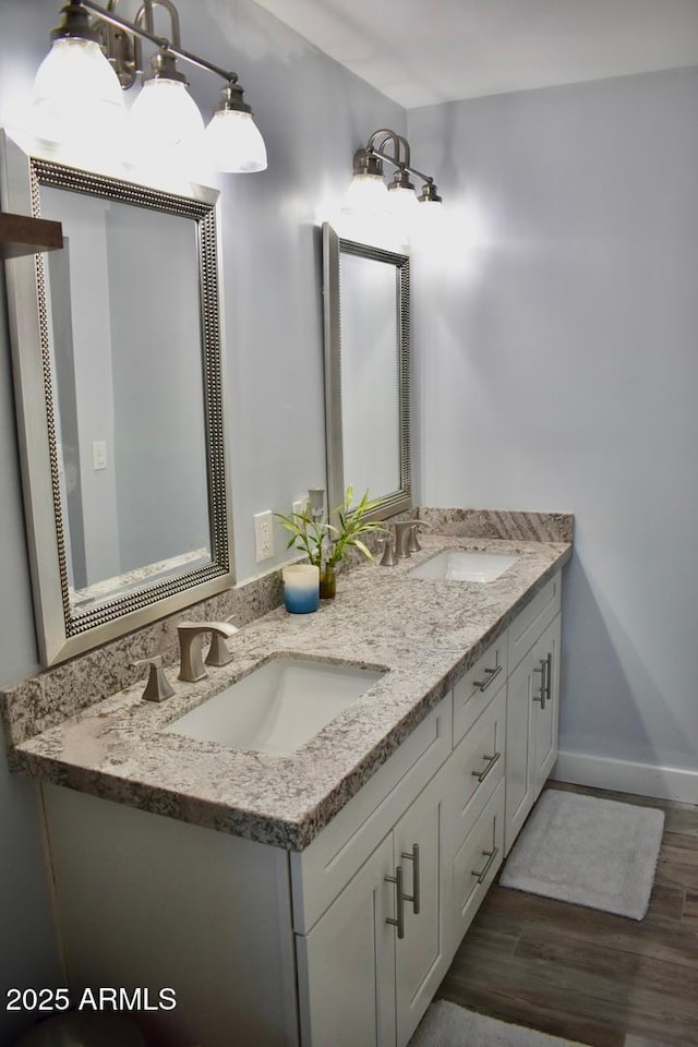 4755 E Gary St, Mesa, AZ 85205 - bathroom with double vanity and wood finished floors