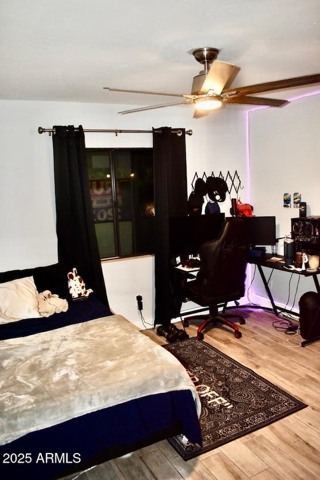 4755 E Gary St, Mesa, AZ 85205 - bedroom featuring wood finished floors and a desk