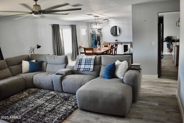4755 E Gary St, Mesa, AZ 85205 - living room with a ceiling fan and wood finished floors