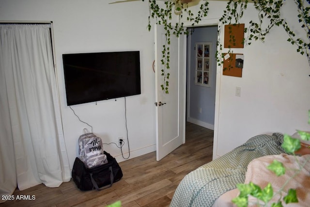 4755 E Gary St, Mesa, AZ 85205 - bedroom featuring wood finished floors and baseboards