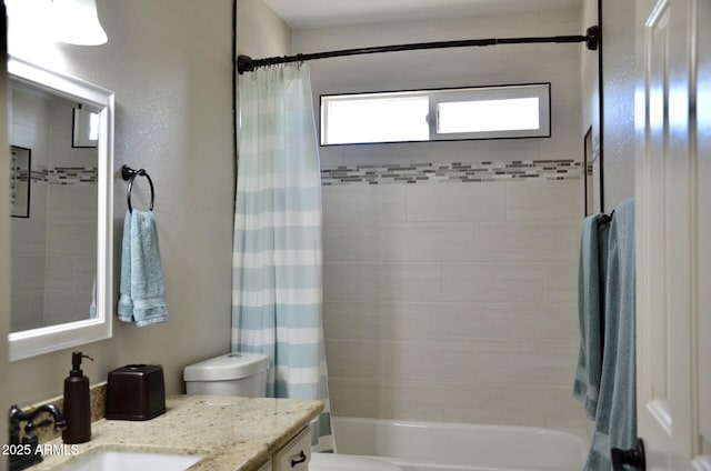 full bathroom featuring vanity, toilet, and shower / bath combo