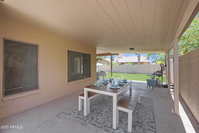 view of patio / terrace featuring outdoor dining space and a fenced backyard