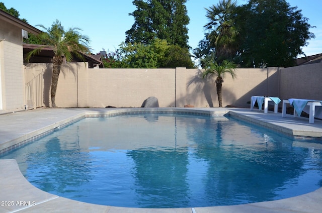 view of pool with a fenced backyard and a fenced in pool