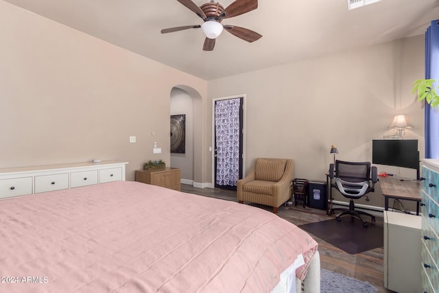 bedroom featuring hardwood / wood-style flooring and ceiling fan