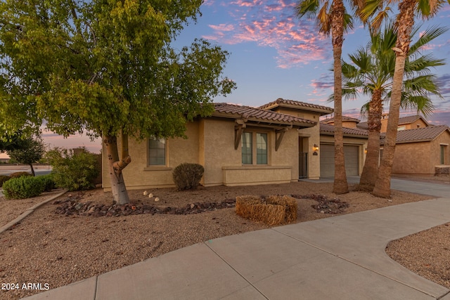 view of front of property featuring a garage