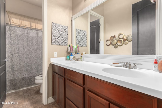 full bathroom featuring toilet, shower / tub combo with curtain, vanity, and tile patterned flooring