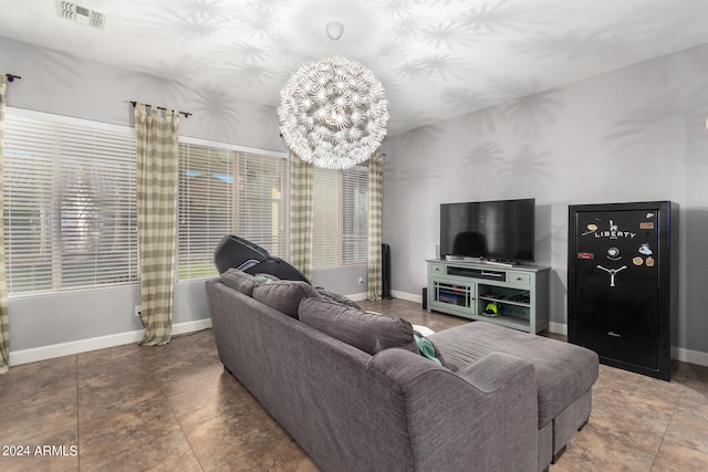 living room featuring a notable chandelier