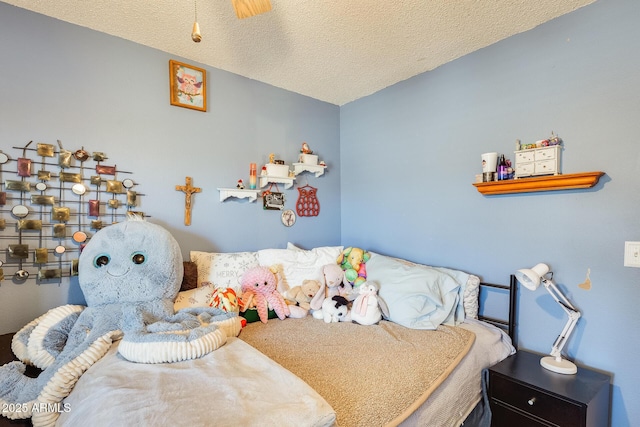 bedroom featuring a textured ceiling