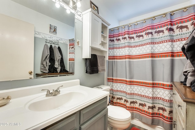 full bathroom with vanity, toilet, and a shower with curtain