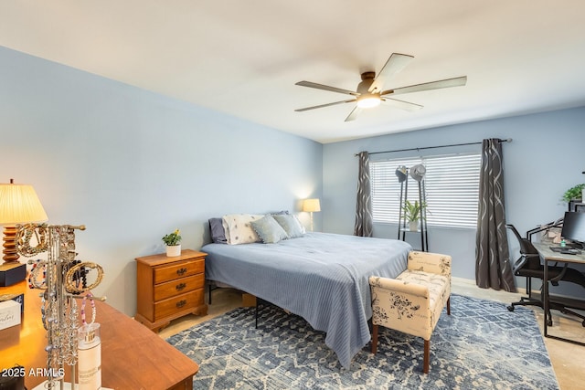 bedroom featuring ceiling fan and light colored carpet