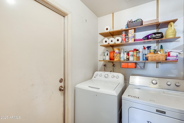 laundry room featuring laundry area and washing machine and clothes dryer