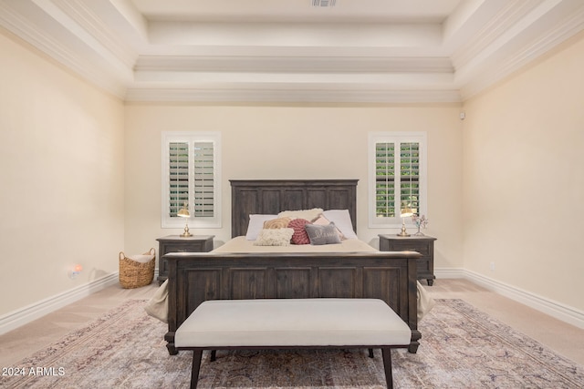 carpeted bedroom with a towering ceiling and crown molding