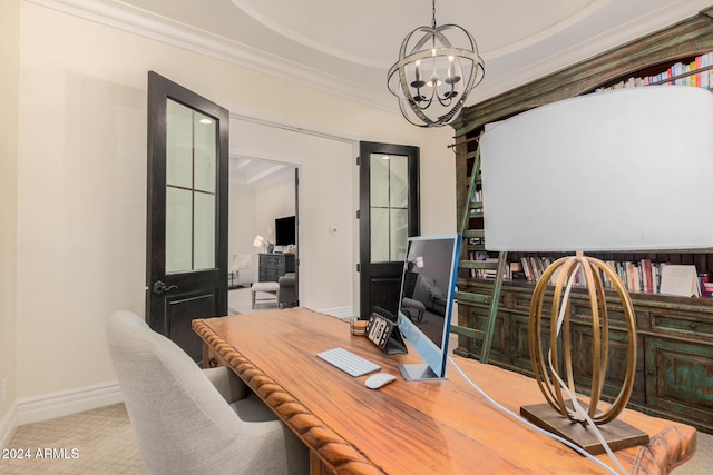 carpeted office space with a notable chandelier, crown molding, and french doors