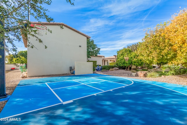 exterior space with basketball court