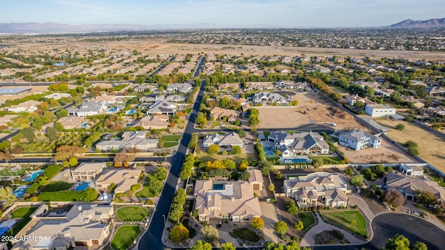 birds eye view of property with a mountain view