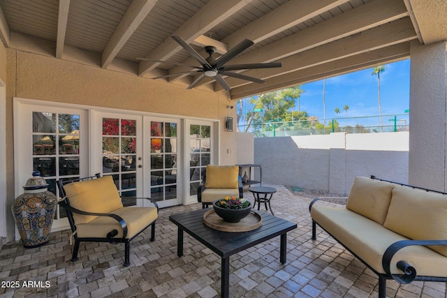 view of patio with outdoor lounge area, ceiling fan, and french doors