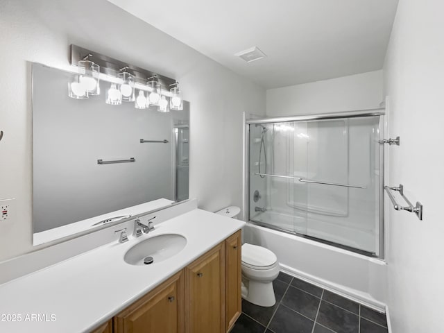 full bath with vanity, visible vents, tile patterned flooring, toilet, and combined bath / shower with glass door