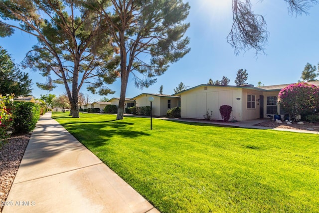 exterior space featuring a front yard