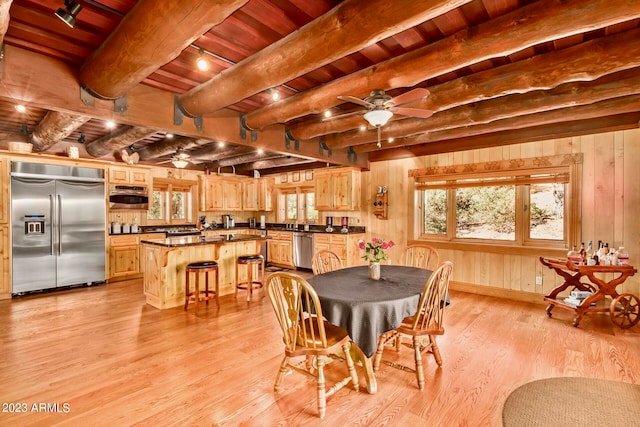 dining room with wooden ceiling, beam ceiling, ceiling fan, and light wood-type flooring