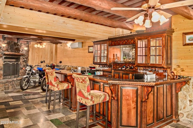 bar featuring wood ceiling, tile flooring, beam ceiling, and wooden walls