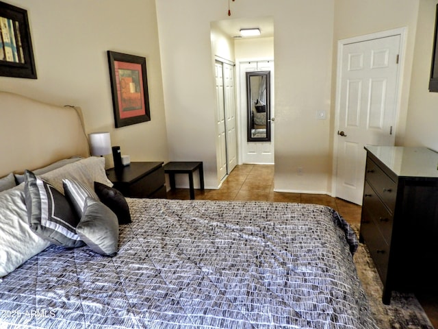 tiled bedroom with baseboards
