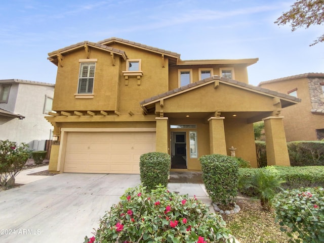 4319 E Vaughn Ave, Gilbert, AZ 85234 - view of front of home featuring stucco siding, a garage, concrete driveway, and a porch