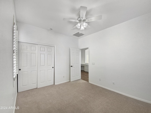 unfurnished bedroom with multiple windows, ceiling fan, a closet, and carpet