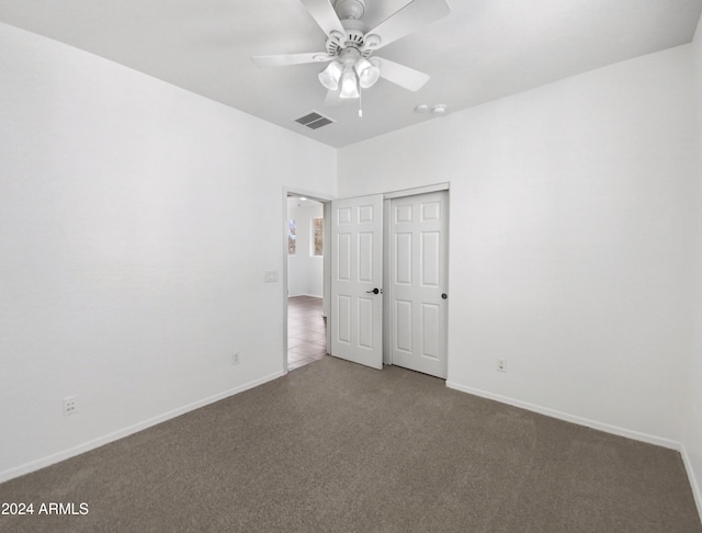 4319 E Vaughn Ave, Gilbert, AZ 85234 - unfurnished bedroom with carpet flooring, a closet, and ceiling fan