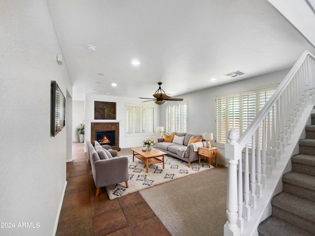 4319 E Vaughn Ave, Gilbert, AZ 85234 - living area with stairs, ceiling fan, recessed lighting, and a tiled fireplace