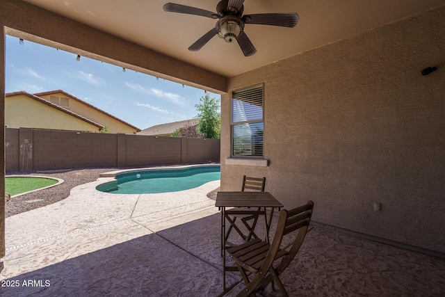 12503 W Vista Paseo Dr, Litchfield Park, AZ 85340 - view of pool with a patio, a ceiling fan, and a fenced backyard