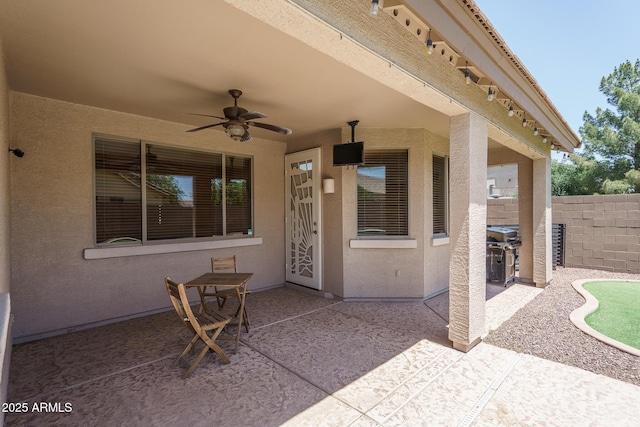 12503 W Vista Paseo Dr, Litchfield Park, AZ 85340 - view of patio / terrace with ceiling fan, fence, and a grill