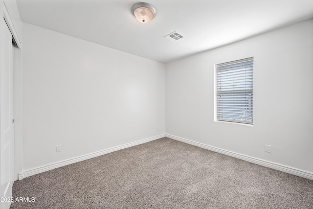 view of carpeted spare room