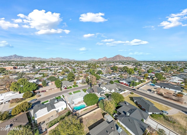 drone / aerial view featuring a mountain view