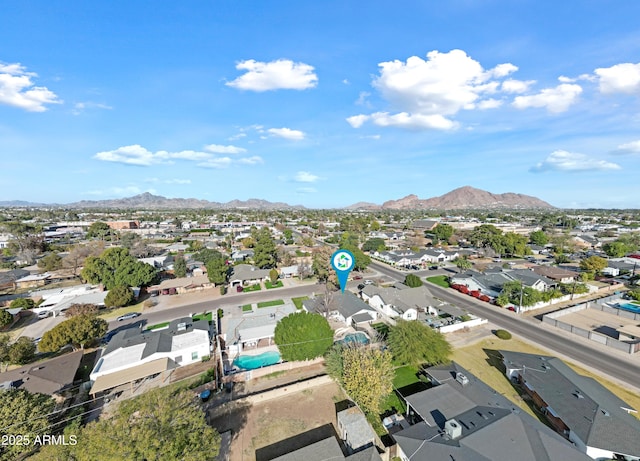 bird's eye view with a mountain view