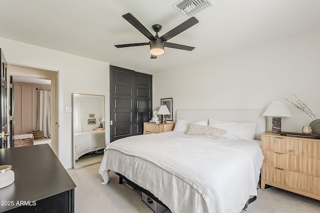 8320 E Monte Vista Rd, Scottsdale, AZ 85257 - bedroom with light carpet and a ceiling fan