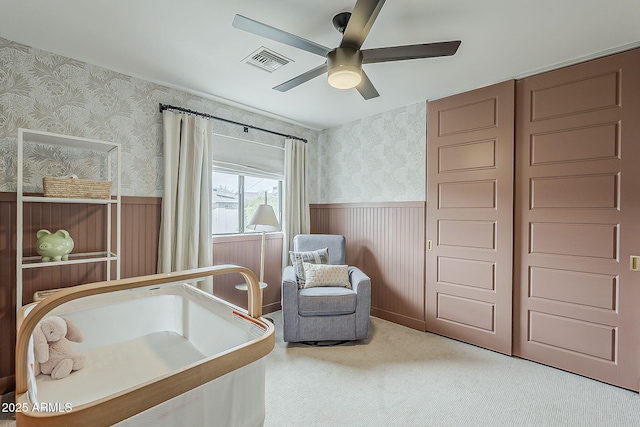 8320 E Monte Vista Rd, Scottsdale, AZ 85257 - bedroom featuring wallpapered walls, wainscoting, carpet, and a ceiling fan