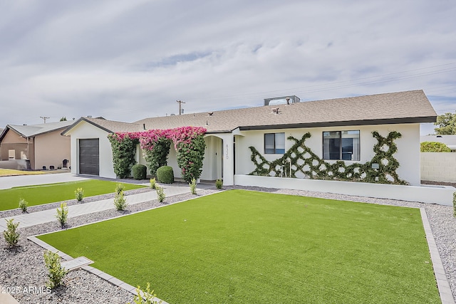8320 E Monte Vista Rd, Scottsdale, AZ 85257 - ranch-style home featuring a front lawn, stucco siding, and a garage