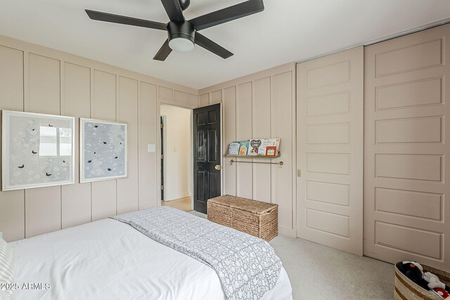8320 E Monte Vista Rd, Scottsdale, AZ 85257 - bedroom featuring a decorative wall, light carpet, and ceiling fan