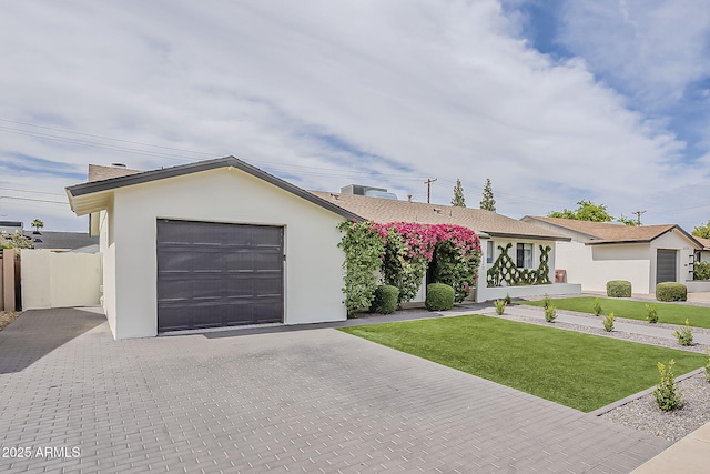8320 E Monte Vista Rd, Scottsdale, AZ 85257 - ranch-style home featuring stucco siding, decorative driveway, and central AC unit